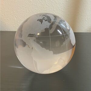 Frosted crystal ball with map of the world